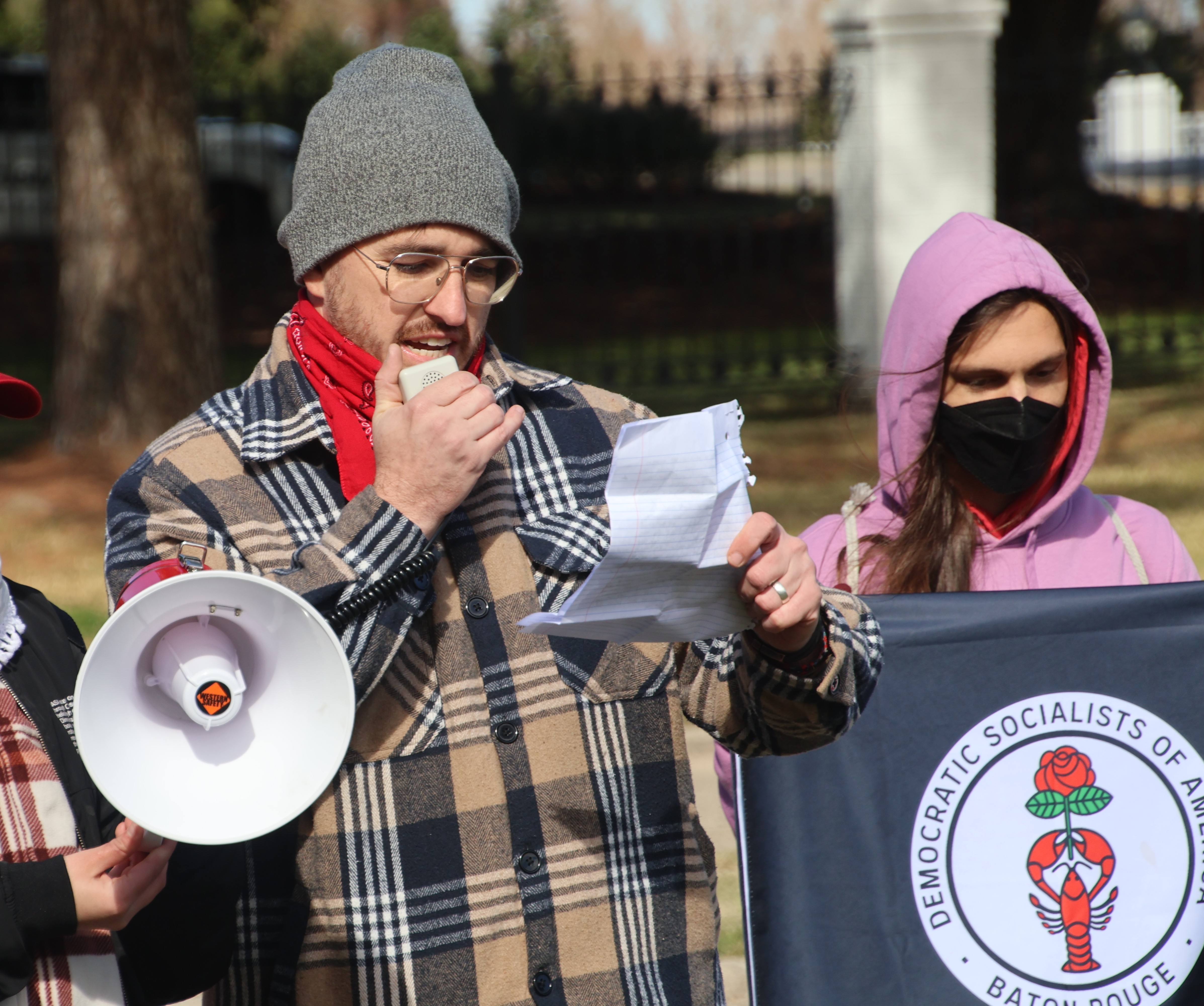 Jacob delivering speech outside Landry's mansion